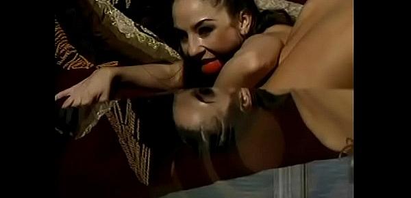  Busty blonde dominatrix Carolyn Monroe told her darkhaired slave Jewell Marceau to caress pussy of Briana Banks with her mouth gag